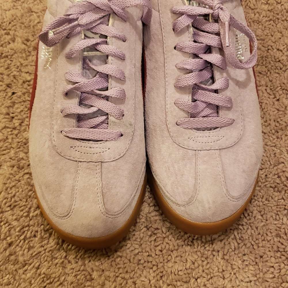 Purple and red Puma shoes